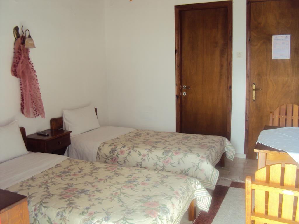 Vassilis Guesthouse Rapsáni Pokoj fotografie